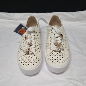Elegant White Women's Sneakers with Gold Accents